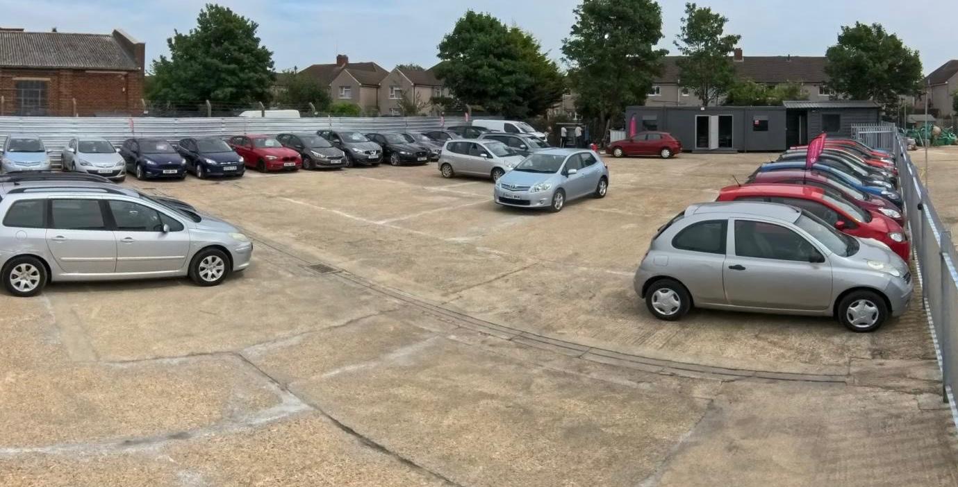 Happy customers at car dealership